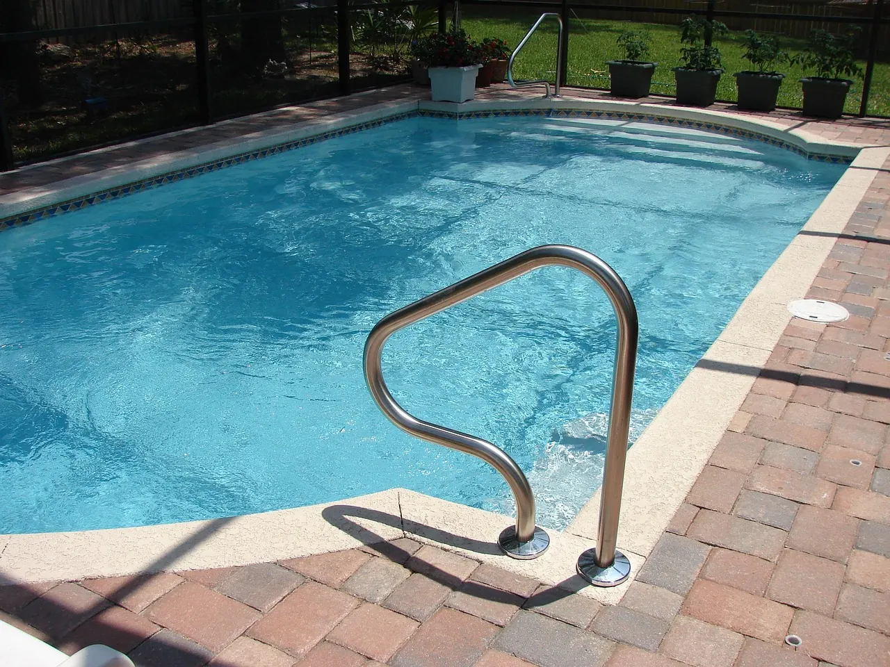 clean swimming pool backyard